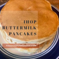 a stack of pancakes with the words hop buttermik pancakes on top and bottom