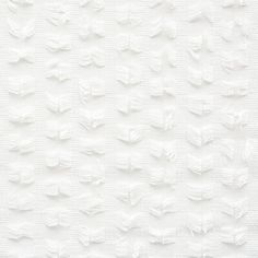 white textured paper with wavy lines on it