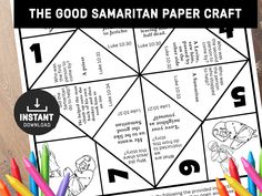 the good samarin paper craft is shown with colored crayons in front of it