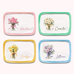 four glass trays with flowers painted on the sides and name written in different languages