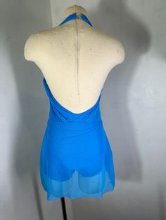 a mannequin with a blue dress on it's head and neckline