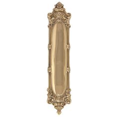 an ornate gold door handle on a white background