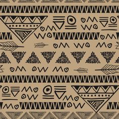 an abstract pattern with black and white shapes on tan background stock photo - 1387982