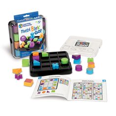 the think and learn game is in its box, with several different colored cubes