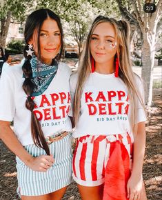 two young women standing next to each other in shorts and t - shirts that say kapp deli