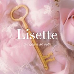 a gold key laying on top of pink fabric with the words lissette written above it