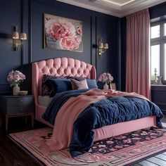 a bedroom with blue walls, pink bedding and an area rug that has flowers on it