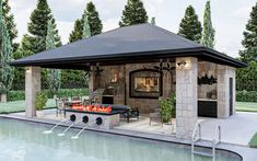 an outdoor kitchen next to a swimming pool