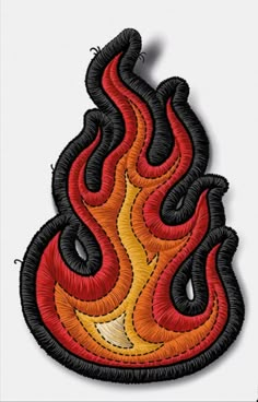 a red and yellow fire embroidered on a white background