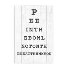 a white wooden sign with the words pee in it and an eye chart on it