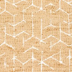 an orange and white rug with arrows drawn on the side, in front of a beige background