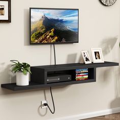 PRICES MAY VARY. 【Unique Asymmetrical Design】This wall TV stand with an attractive unique asymmetrical design, wall-mounted use can save room space. The wire holes are designed to keep your standtop neatly organized. 【Stable and Reliable】This wood tv stand with high MDF material, uniform structure, which makes it sturdy, waterproof and easy to clean. 【Multipurpose Use】The media console suitable living room bedroom home office for storage electronic devices such as routers, set-top boxes, DVD pla Wall Mounted Tv Stand, Mounted Tv Stand, Entertainment Shelves, Floating Media Console, Wall Tv Stand, Wall Mount Entertainment Center, Wall Mounted Media Console, Wall Mount Tv Stand, Tv Stand Shelves