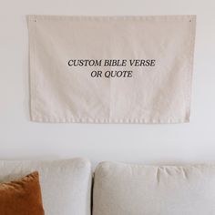 Hand sewn, professionally printed, prayerfully curated, high-quality canvas banners to uplift and inspire the atmosphere of your home! Raise your victory banner as a daily reminder of God's goodness. CUSTOM BIBLE VERSE OR QUOTE Choose a short Bible verse or quote and a font for your custom Victory Banner! PLEASE NOTE: because these are custom, made-to-order banners, the shipping times are longer than our other banners. These banners take 4-5 weeks for production and shipping. DETAILS: Dimensions: Approximately 36"x24" Material: 10oz canvas  Grommets (optional): 1/2" gold  Each banner is carefully hand sewn and professionally screen printed directly onto the material - because of this they may vary slightly.  CARE INSTRUCTIONS: To get rid of any creases in your banner, iron the back of your Bible Verse Tapestry, Christian Tapestry, Short Bible Verses, Canvas Banners, Custom Bible, Scripture Signs, Christian Wall Decor