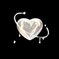 a heart shaped object on a black background