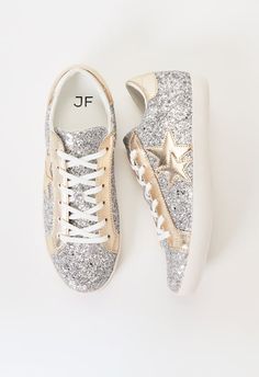 Material: Faux Leather Heel Height: 1.5" Closure: Adjustable Laces Imported. Casual Lace-up Sneakers With Glitter Print, Silver Embellished Low-top Sneakers, Lace-up Synthetic Sneakers With Glitter Print, Synthetic Low-top Sneakers With Glitter Accents, Gold Low-top Sneakers With Glitter Accents, Denim Heels, Fashion Shoes Sneakers, Faux Leather Heels, Light Denim