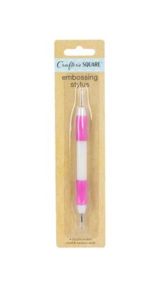 a pink and white pen in its packaging