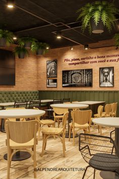 the interior of a restaurant with tables and chairs