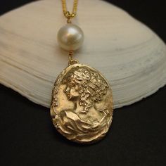 Handmade Victorian jewelry Aphrodite necklace based on a Rococo cameoAphrodite, ancient Greek goddess of sexual love and beauty, identified with Venus by the Romans. The Greek word aphros means “foam,” and Hesiod relates in his Theogony that Aphrodite was born from the white foam produced by the severed genitals of Uranus (Heaven), after his son Cronus threw them into the sea. Aphrodite was, in fact, widely worshipped as a goddess of the sea and of seafaring; she was also honoured as a goddess o Venus Necklace, Goddess Of Love And Beauty, Greek Mythology Jewelry, Ancient Greek Jewelry, Mythology Jewelry, Love And Beauty, Roman Jewelry, Necklace With Pearl, Tarpon Springs