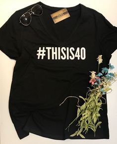 a t - shirt that says this is 40 with flowers and sunglasses on the side