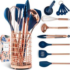 copper and blue kitchen utensils in a holder