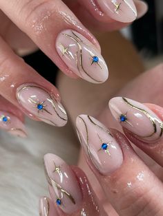 Too beautiful not to stare ✨ . . . . #nails #nailart #nailsnailsnails #nailinspo #nudenails #elegantnails #chrome #chromenails #blue #shortnails #acrylicnails #almondnails #ovalnails #elegantnails #weddingnails #cutenails #beautifulnails #starnails #summernails #goldnails #mnnails #mnnailtech #minnesotanails #minnesotanailtech #minneapolisnails #minneapolisnailtech #nailsofinstagram #instagramnails #fashion Gold Chrome Oval Nails, Night Sky Inspired Nails, Pearl Purple Nails, Ethereal Nails Acrylic Almond, Ethereal Nail Design, Blue Detail Nails, Ethereal Nail Art, Greek Mythology Nail Art, Short Nail Designs Gold