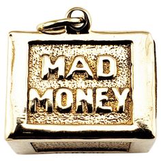 14 Karat Yellow Gold Mad Money Charm- Never leave home without your "mad money"! This fun charm features a 3D box with the words "MAD MONEY" embossed on its front. a $1 bill is encased inside. Meticulously detailed in 14K yellow gold. *Chain not included Size: 11 mm x 14 mm Weight: 3.4 dwt. / 5.3 gr. Stamped: 14K Hallmark: BEATON Very good condition, professionally polished. Will come packaged in a gift box or pouch (when possible). Mad Money, You Mad, Brunch Outfit, In 3d, Vintage Charms, Hallmark, Gift Box, Charms, Charm Bracelet