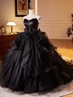 Embrace your inner gothic princess with this exquisite wedding dress. Crafted with meticulous attention to detail, this gown combines comfort and style. Black Masquerade Ball Gowns, Black Dramatic Dress, Goth Victorian Wedding Dress, Gothic Black Prom Dress, Goth Grad Dress, Royal Gothic Dress, Purple Black Wedding Dress, Gothic Victorian Wedding Dress, Black Wedding Dress Gothic Lace Gowns