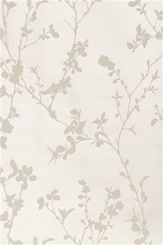 a white wallpaper with grey leaves and branches on the back ground, in front of a light gray background