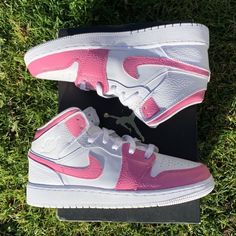 Take flight in custom-made rosé pink and white Air Jordan 1s. Feel the rush of adrenaline as you lace up and take to the streets. Ready for any challenge, these shoes are as stylish as they are daring. Slay the game, one step at a time! 🎉 Exactly as shown in the pictures. 📷 Brand New & Authentic. 💯 Hand Painted with attention to detail. 👨‍🎨 Waterproof and Flexible. ❤️ Unisex model. Please refer to the Size Chart. 👟👫 Free Worldwide Shipping. ✈️🌍 Pink Low-top Basketball Shoes For Streetwear, Pink Sneakers For Streetwear With Laces, Pink High-top Sneakers For Training, Training Sneakers With White Sole And Round Toe, Training Custom Sneakers With White Sole And Round Toe, Custom Training Sneakers With White Sole And Round Toe, Custom Training Sneakers With Boost Midsole And Round Toe, Sporty Pink Mid-top Skate Shoes, Pink Mid-top Sporty Skate Shoes