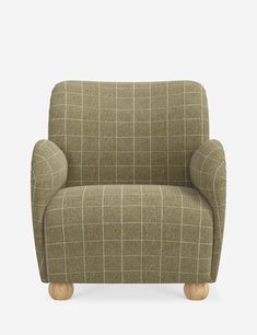 a chair that is sitting in front of a white background with a checkered pattern on it