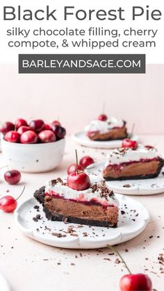 three slices of black forest pie on plates with cherries and whipped cream in the background