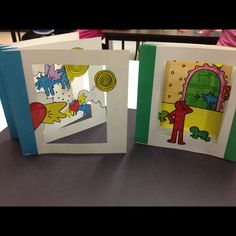 two children's books are sitting on a table, one is open and the other is closed