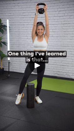 a woman holding up a kettle while standing in front of a wall with the words one thing i've learned is that