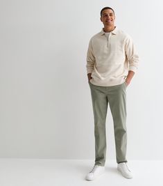 New Look Olive Slim Fit Chinos. Mens. Designed in a neutral colourway with a soft finish, these olive chinos are a versatile pick. Pair with a crisp white shirt and trainers for a staple ensemble. Olive. Mid rise. Belt loops. Side and back pockets. Button and zip-fly fastening. Soft cotton blend. Slim fit. Model is 6'2"/188cm and wears 32"/81cm regular. Olive Green Chinos Outfit Men, Men Chinos Outfit, Olive Green Pants Outfit Men, Olive Pants Outfit Men, Green Chino Outfit Men, Men Chino Outfit, Olive Pants Men