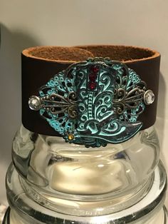 Turquoise Cowboy Boot with Gems Leather Cuff with snap closure. Turquoise Cowboy Boots, Cowboy Boot, Leather Cuffs, Festival Captain Hat, Snap Closure, Cowboy Boots, Cuff Bracelets, Leather Bracelet, Jewelry Bracelets