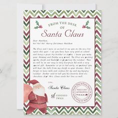 a christmas letter from santa claus on a card with the words, from the desk of santa claus