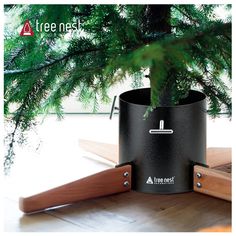 Scandinavia style designed in Finland makes the Christmas tree look more suitable for your home style, no Christmas tree collar or skirt needed with this Christmas tree stand! Key Product Features Strong legs made from sustainable beech hardwood, this ensures the live Christmas tree to stand straight. Ergonomic design using the smartest bolts and nuts to help you putting up your Christmas tree fast and easy Christmas tree holder can be filled with 1.27gal of water to keep the real Christmas tree fresh High-tech production combined with the best coating, no worries about leakage, protect your carpets and floors from water Christmas tree base support trees up to 2.4 to 5.5inch in diameter and 10ft tall. We suggest that you measure your Christmas tree to make sure the perfect fit. As always T Elevated Tree Stand, Dyi Tree Stand, Christmas Tree Rotating Stand, Homemade Christmas Tree Stand For Real Tree, 10ft Christmas Tree, Rotating Christmas Tree Stand, No Christmas Tree, Trees Decoration, Christmas Tree Holder