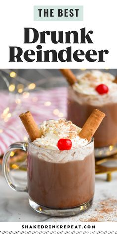 two mugs filled with hot chocolate drink and topped with cinnamon sticks