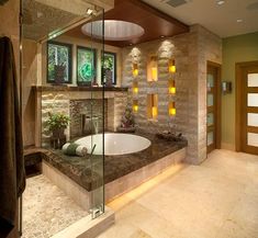 a bathroom with a large tub next to a walk in shower