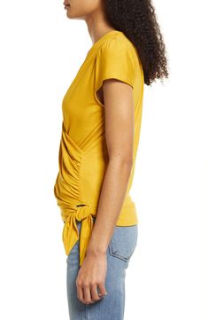 A faux-wrap front flatters on this soft and versatile jersey top cinched with a saucy tie at the hip. 23 1/2" length Surplice V-neck Short sleeves 95% rayon, 5% spandex Machine wash, dry flat Imported Women's Clothing V-neck Twist Front Top For Day Out, Twist Front V-neck Top For Day Out, Summer V-neck Twist Front Tops, Versatile V-neck Top For Spring, Versatile Ruched Tops For Spring, Versatile Wrap Top With Tie Waist, Casual Twist Front Top For Day Out, Tie Waist Wrap Top For Day Out, Wrap Top With Tie Waist For Day Out