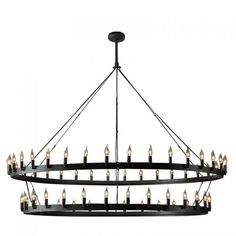 a large chandelier with many candles hanging from the center and two rows of lights on