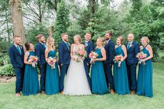 a bride and groom with their bridal party