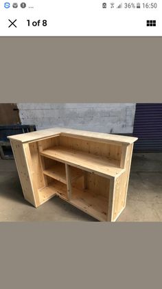 an unfinished wooden cabinet is shown on the screen, and it appears to be made out of plywood