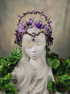 This purple fairy flower headpiece is like a secret garden to wear.  A beautiful floral halo headdress, this purple flower crown has an elevated halo and a magical forehead feature. This headpiece is so detailed with little bits of magic that it almost seems like a squirrel could pop out! Lots of purple flowers and a gorgeous elevated halo of vines, berries and flower sprigs give a whimsical vision to take your costume or outfit to the next level. In addition to this is a gorgeous Elven style fo Fantasy Headdresses, Branch Headpiece, Purple Flower Crown, Fairy Flower Crown, Halo Headpiece, Floral Headdress, Fairy Cosplay, Purple Fairy, Flower Headdress