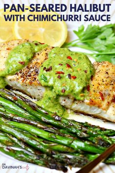 grilled salmon with chimichurri sauce and asparagus on a white plate