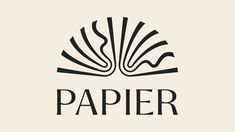 the logo for papier is shown in black on a white background with an open book