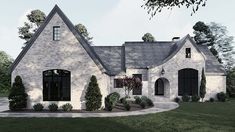 a white brick house with black shutters on the front and side windows is shown