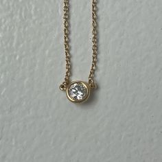 Approx. .25ct (As Per Tiffany’s Experts) On 16” 18k Yellow Gold Chain. Stamped “Tiffany&Co.” “750” And “Peretti” On The Clasp. There Is Also A Unique Serial Number Etched Into The Clasp. Retails For Over $2,300. No Box But Authenticated By Poshmark. Tiffany Necklace Yellow Diamond, Tiffany And Co Yellow Diamond Necklace, Tiffany Interlocking Circles Necklace, Diamonds By The Yard Necklace, Diamond Necklace Pendant Tiffany & Co., Tiffany Hardware Necklace, Diamonds By The Yard, Jewelry Tiffany, Tiffany Co Jewelry