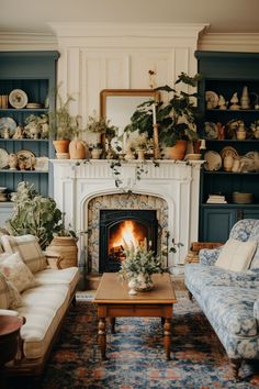 a living room filled with furniture and a fire place