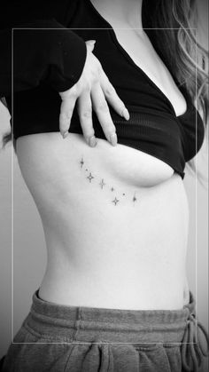 a woman's stomach with stars on it